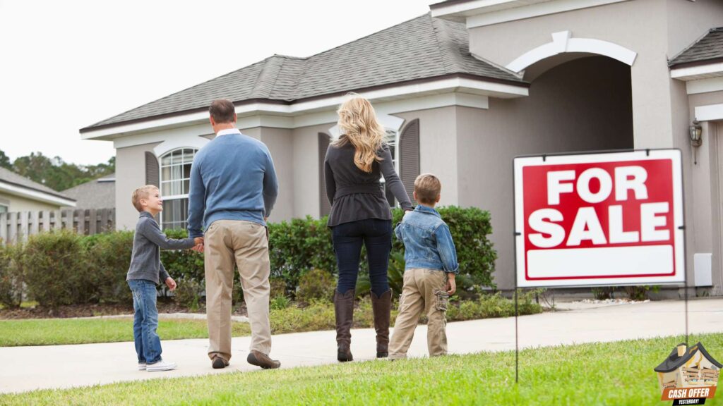 Family walking inside a home with a 'For Sale' sign - We Buy Houses in Decatur TX